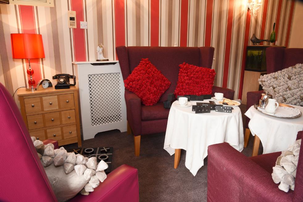lounge with red armchairs